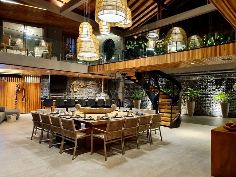 Beachfront house for sale with pool and oceanfront access.