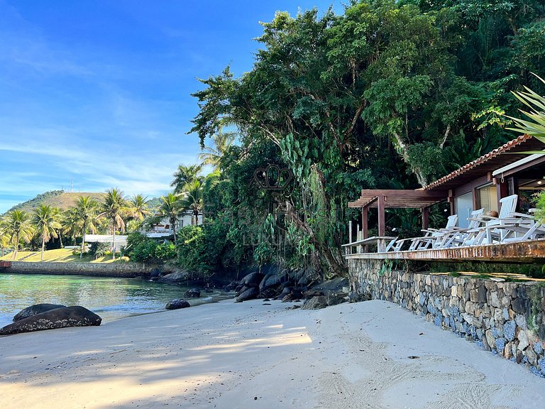 Beachfront house for sale in a gated an idyllic beach.