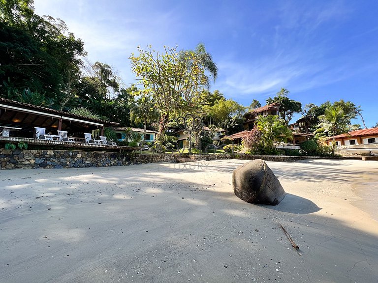 Beachfront house for sale in a gated an idyllic beach.