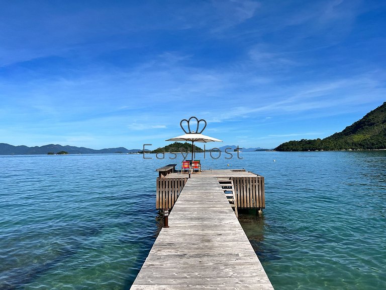 Beachfront house for sale in a gated an idyllic beach.