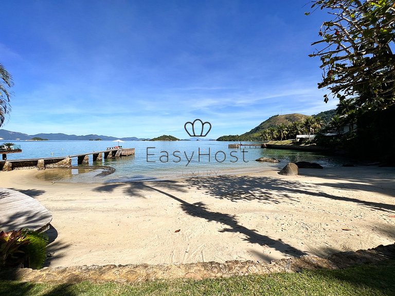 Beachfront house for sale in a gated an idyllic beach.
