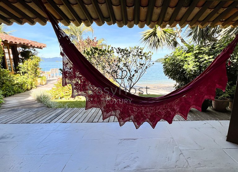 Beachfront house for sale in a gated an idyllic beach.