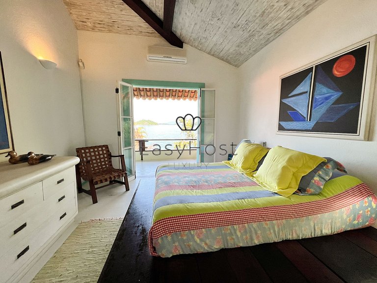 Beachfront house for sale in a gated an idyllic beach.