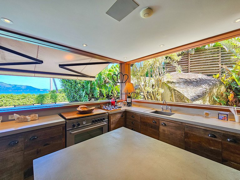 Vacation home in Angra with beachfront pool and sauna.