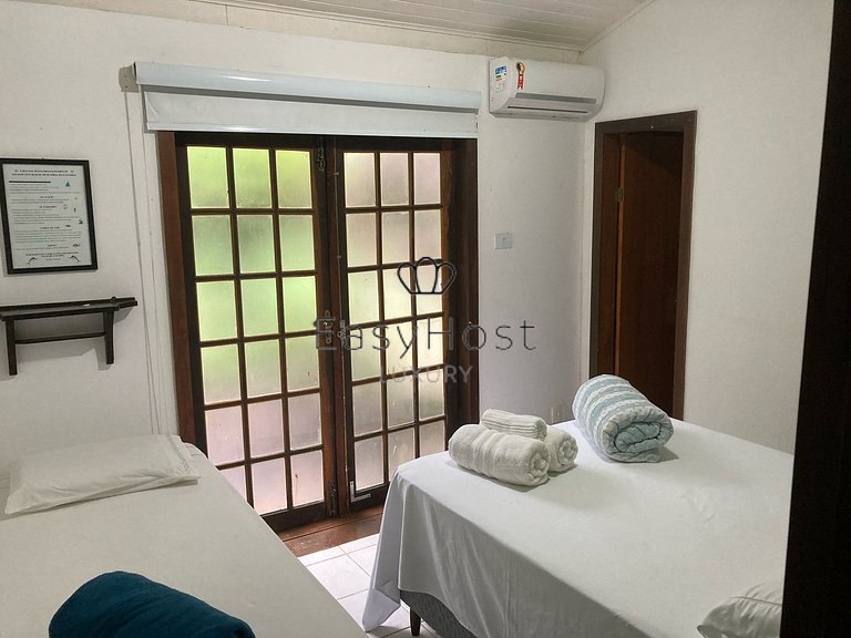 Casa à venda em Iha Grande beira mar com deck e amplo terren