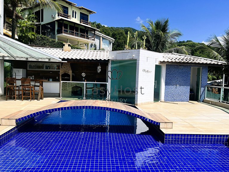 House for sale in a gated community with pool and beach.