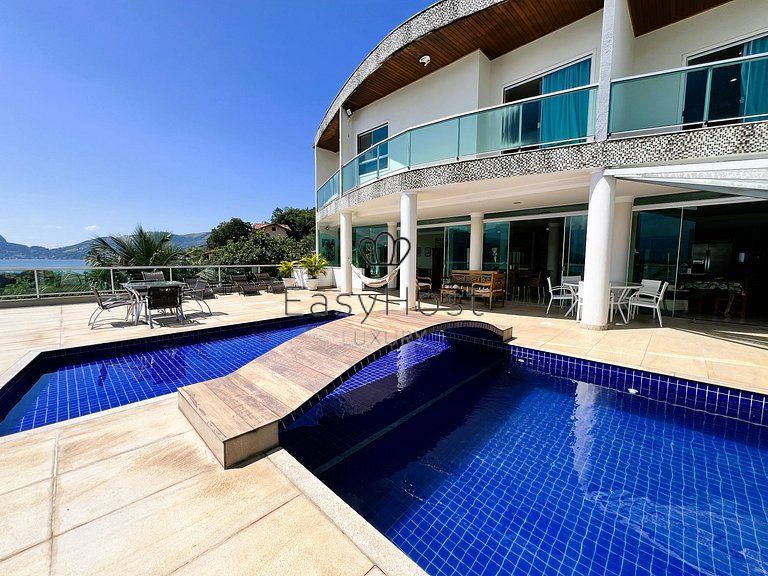 House for sale in a gated community with pool and beach.