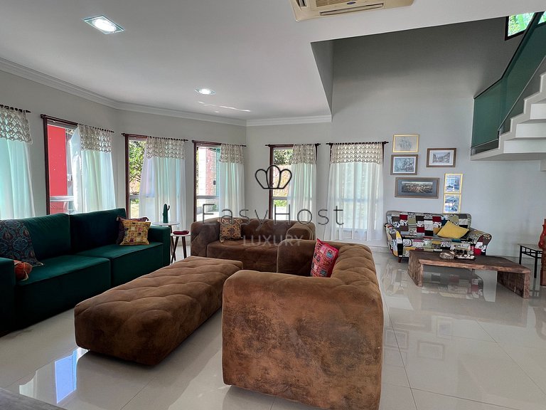 House for sale in a gated community with pool and beach.