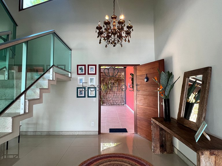 House for sale in a gated community with pool and beach.