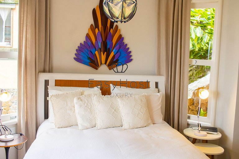 Casa à venda em angra dos reis, frente ao mar com 4 suítes