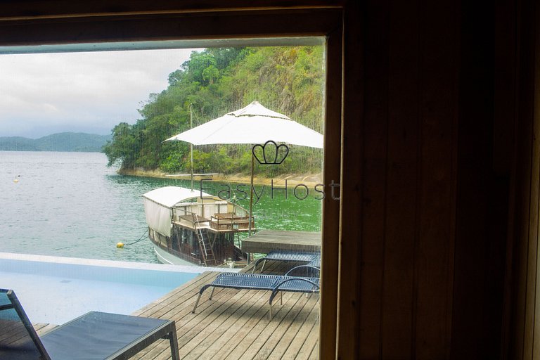 Casa à venda em angra dos reis, frente ao mar com 4 suítes