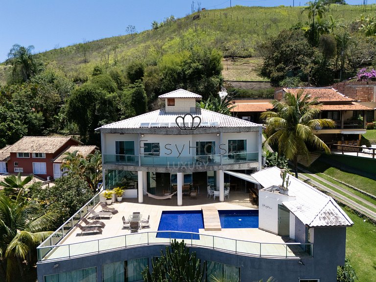 Casa à venda em condomínio fechado com piscina e praia