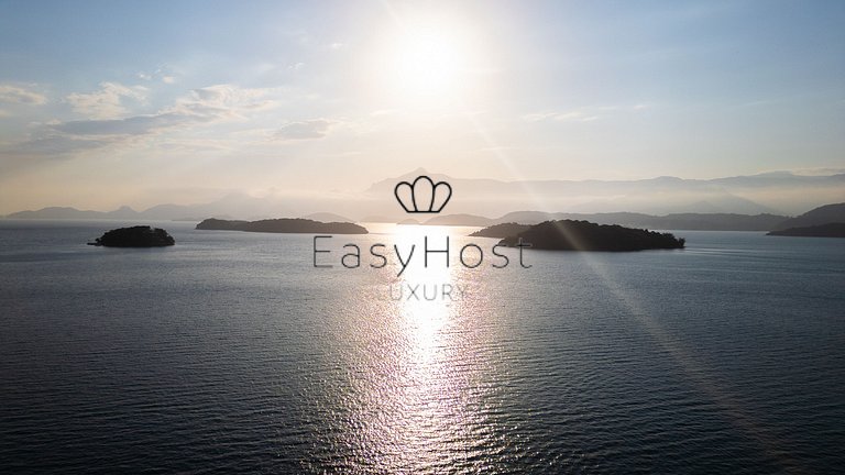 Linda casa com piscina e hidromassagem à beira-mar em Angra