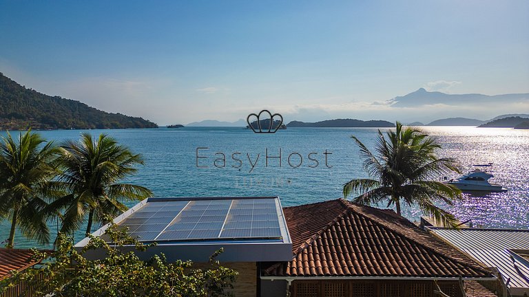 Linda casa com piscina e hidromassagem à beira-mar em Angra