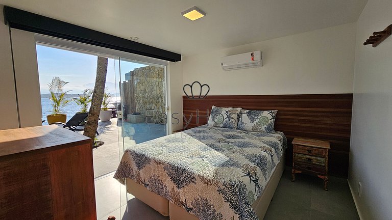 Linda casa com piscina e hidromassagem à beira-mar em Angra