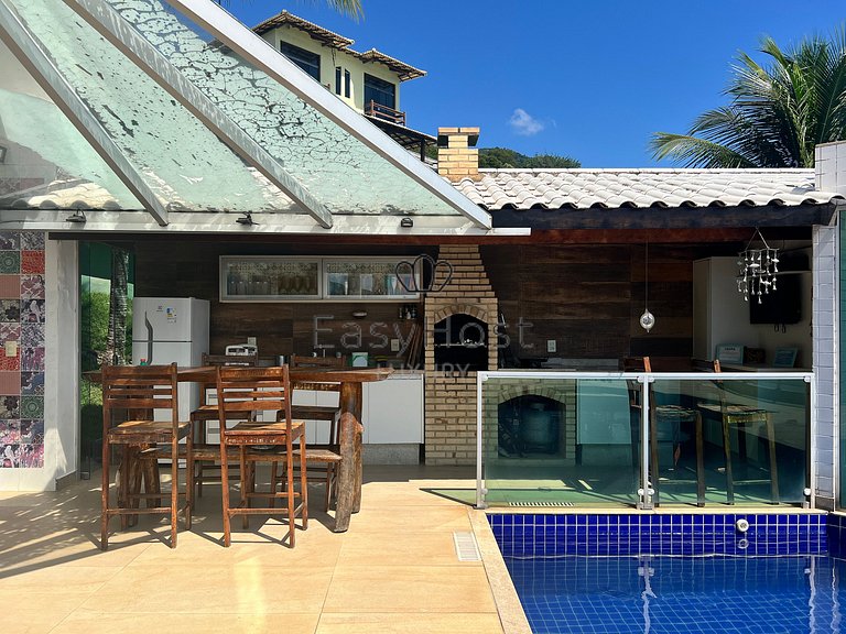 House for sale in a gated community with pool and beach.