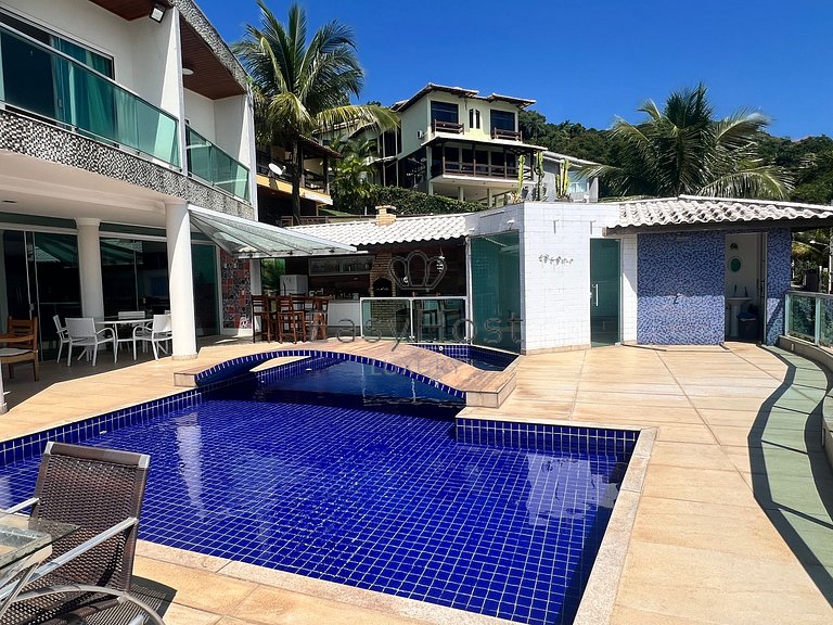 House for sale in a gated community with pool and beach.