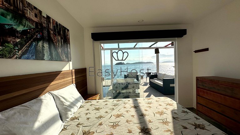 Linda casa com piscina e hidromassagem à beira-mar em Angra